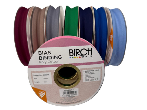 Spools of bias binding with a 'Birch' label on a white background